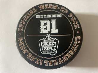 Energie Karlovy Vary Outdoor Triple warm-up used puck (L. Zetterberg)